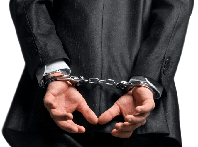 Man in handcuffs for trademark offense Trademark criminal law